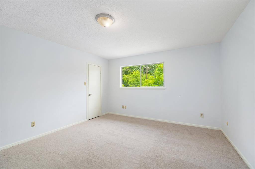 Fresh paint and brand-new carpet make each secondary bedroom feel clean, comfortable, and ready for your personal touch.