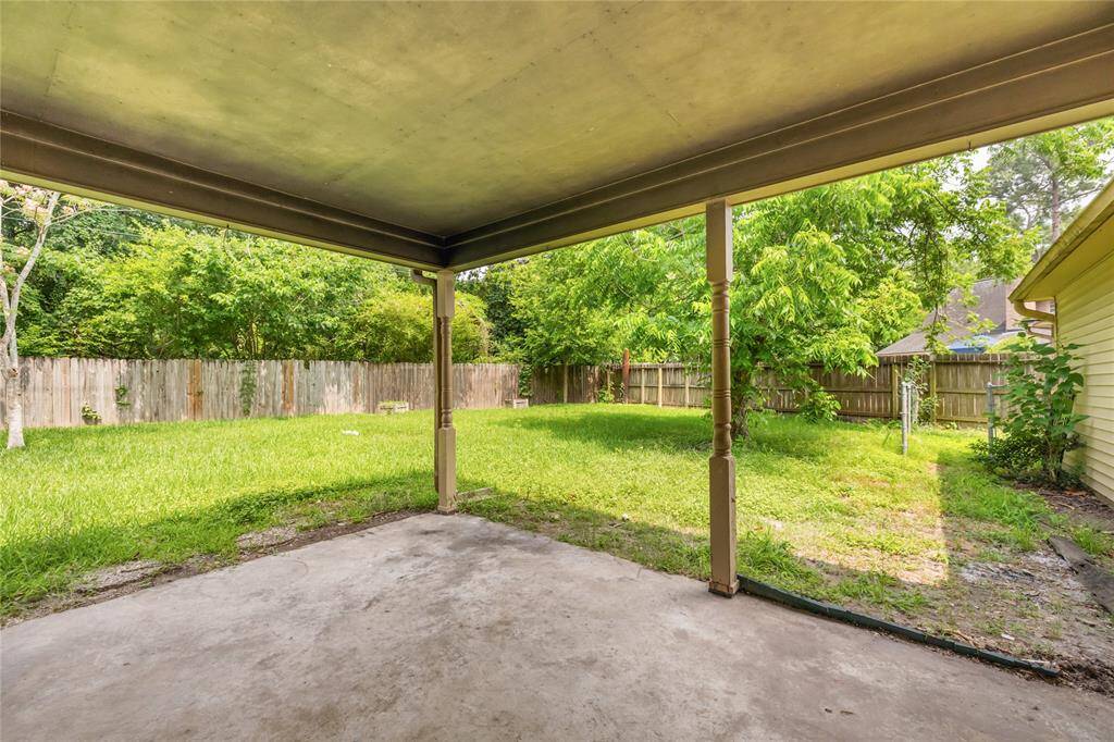 Enjoy your mornings or unwind in the evening beneath the covered patio, overlooking a spacious backyard just waiting for your vision.