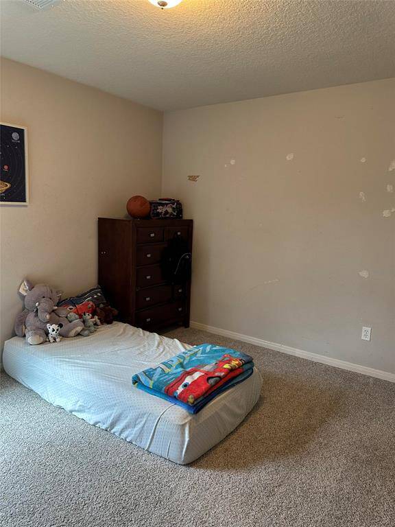 Bedroom 3 is spacious and just needs some paint