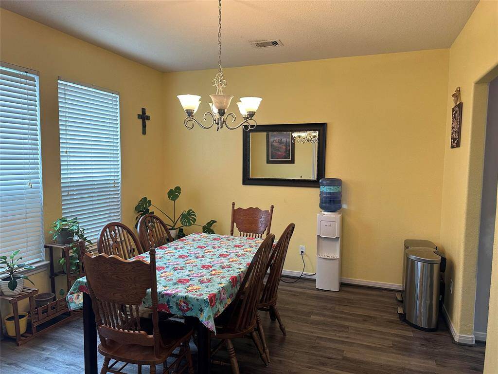 This formal dining room is just off the kitchen and is spacious enough for large gatherings.