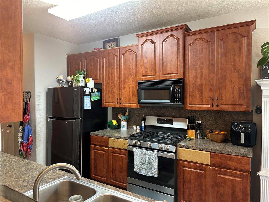 a little TLC will spruce up this kitchen.