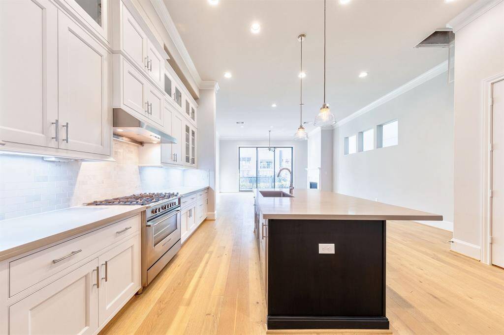 gorgeous chef's kitchen with SS Bosch appliances and soaring 12ft ceilings similar to photo