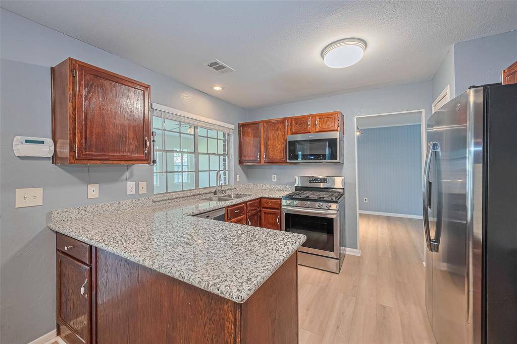 Looking through the kitchen to the dining area.
