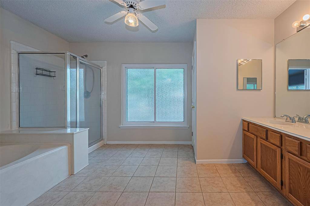 Look at the size of this primary bathroom.
