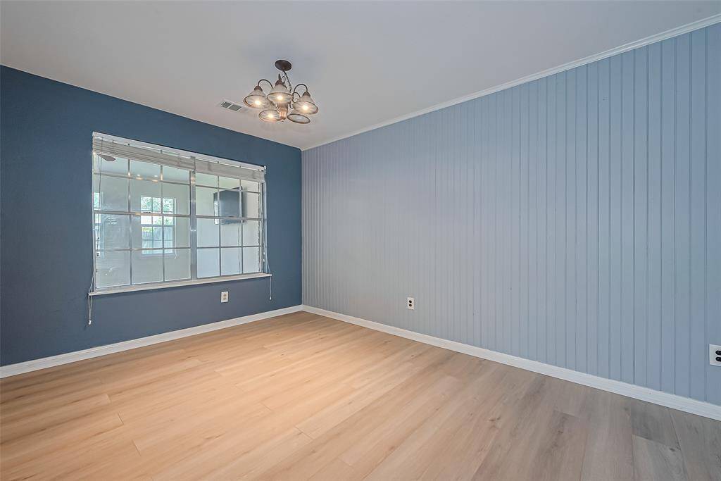 The dining area is conveniently located next to the kitchen.