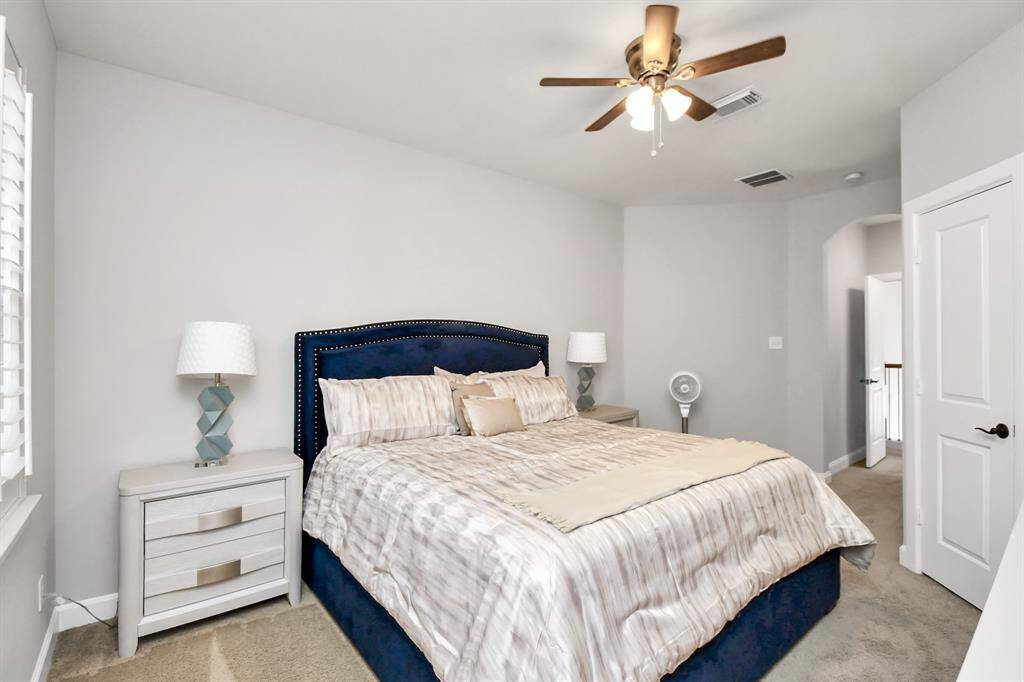 The second bedroom is a versatile and inviting space designed to offer comfort and style. Ideal for guests, family members, or as a multi-functional room, it combines functional design with aesthetic appeal to create a welcoming environment.