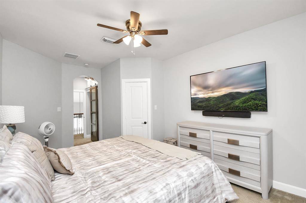The third bedroom is a flexible and thoughtfully designed space that adapts to various needs, whether as a guest room, home office, or children's bedroom. It combines practical features with stylish design elements to create a comfortable and welcoming environment.