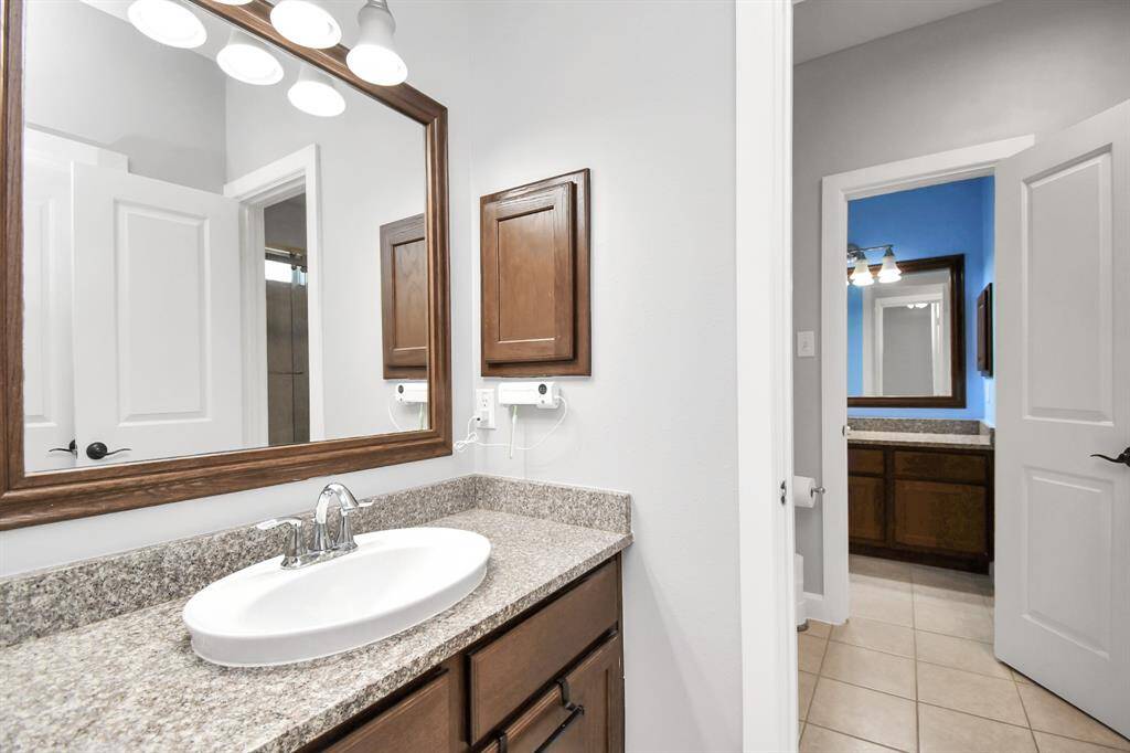 The Jack-and-Jill bathroom is designed to provide a practical and stylish solution for shared use, typically connecting two bedrooms. It combines functionality with elegant design, ensuring comfort and convenience for multiple users while maintaining a cohesive and attractive look.