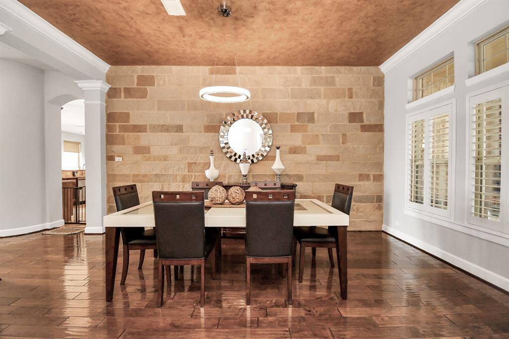The dining area exudes opulence and refinement, offering a perfect blend of classic elegance and modern luxury. It is designed to be both a functional space for everyday dining and a stylish venue for hosting formal gatherings.