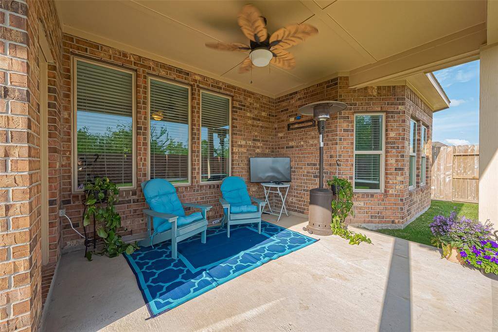 Enjoy the outdoors in comfort with a spacious covered patio, ideal for morning coffee, weekend barbecues, or unwinding after a long day