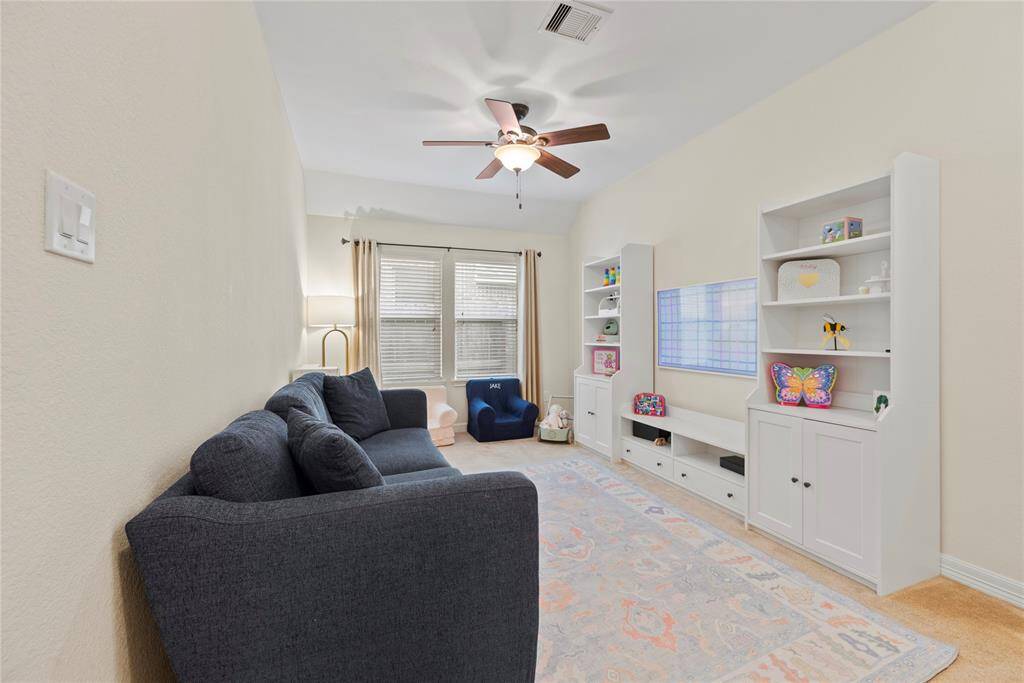 Gameroom, playroom, flex space. situated between secondary bedrooms.