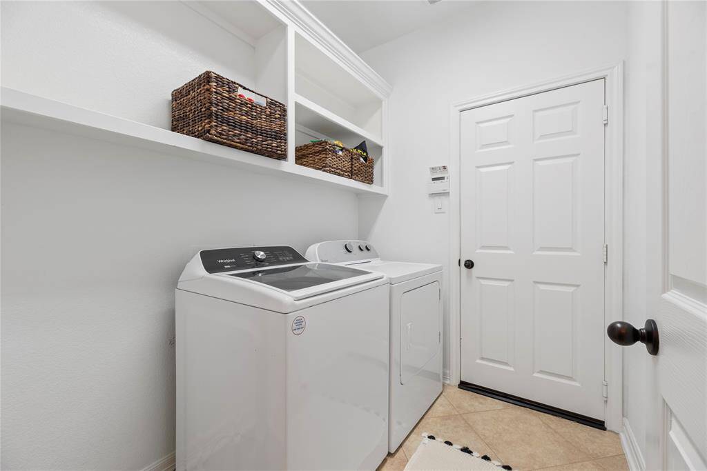 Laundry room with space to work.