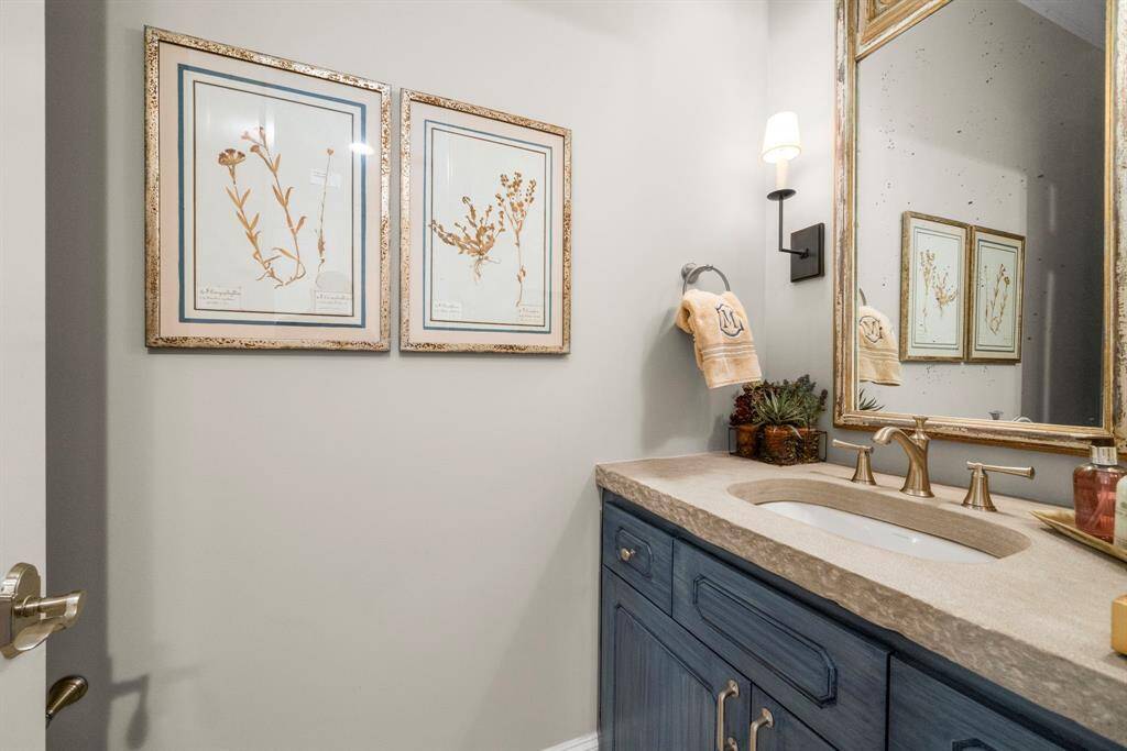 HALF BATH - Sophisticated half bath located downstairs.
