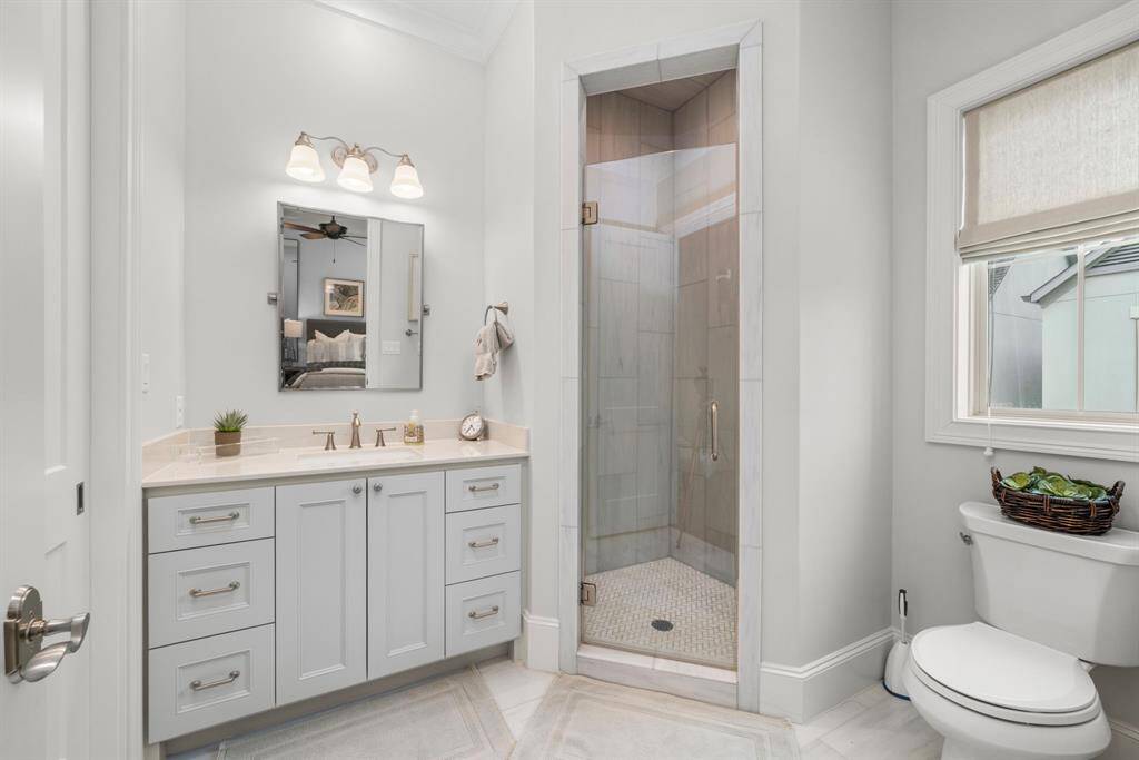 THIRD BATHROOM - This en-suite bathroom is connected to the third bedroom with its gorgeous roomy shower and beautiful sink area.