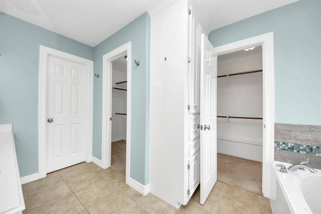 Two, large and separate walk-in closets for all of your fashion needs!