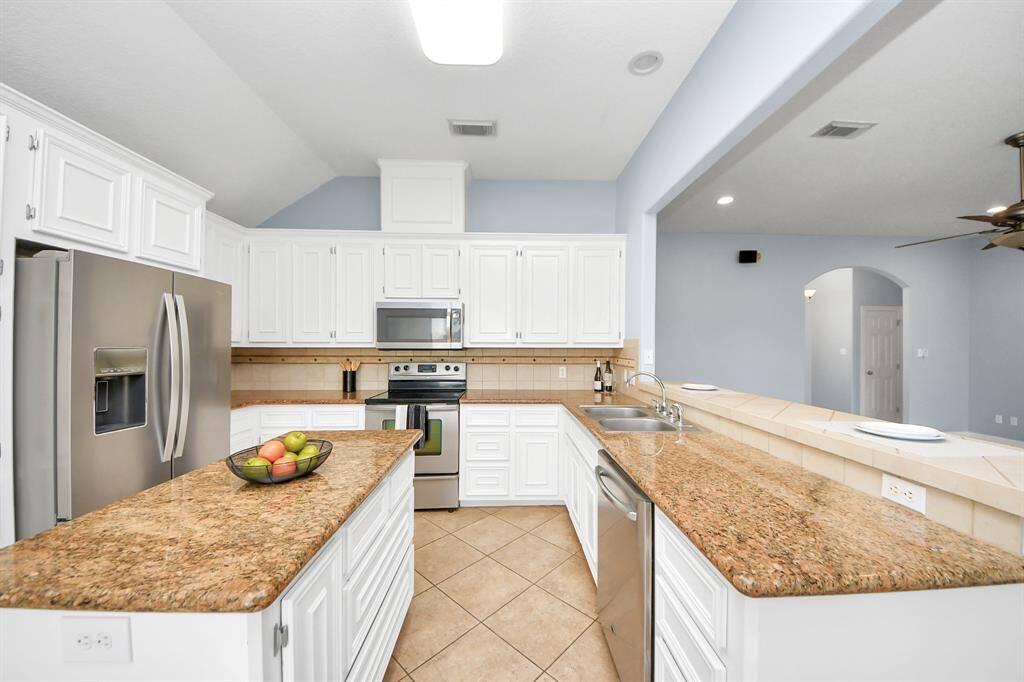 Plenty of counter space and cabinets, including stainless appliances that work great!