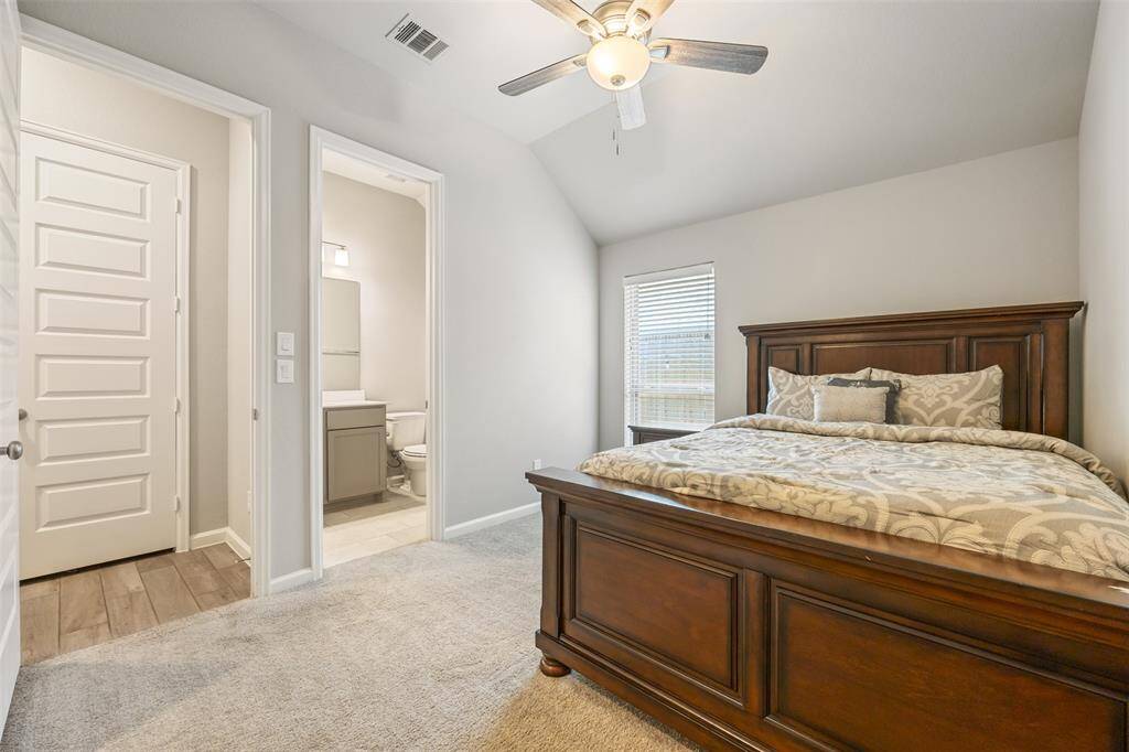 This bedroom is perfect for live in family.  Private bath