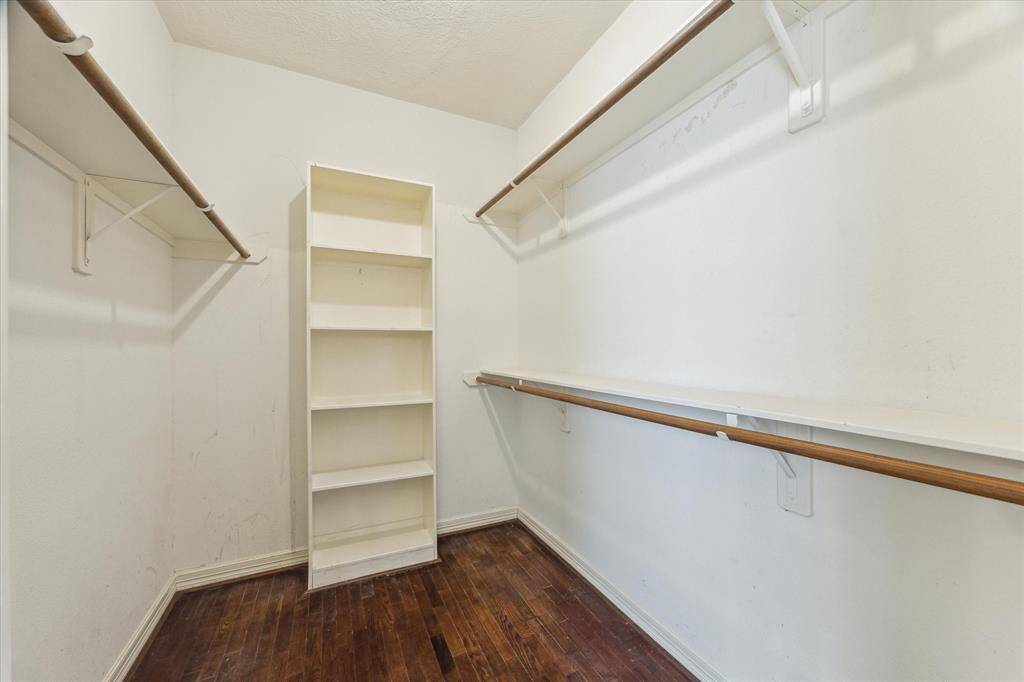 2nd master closet with cupboard