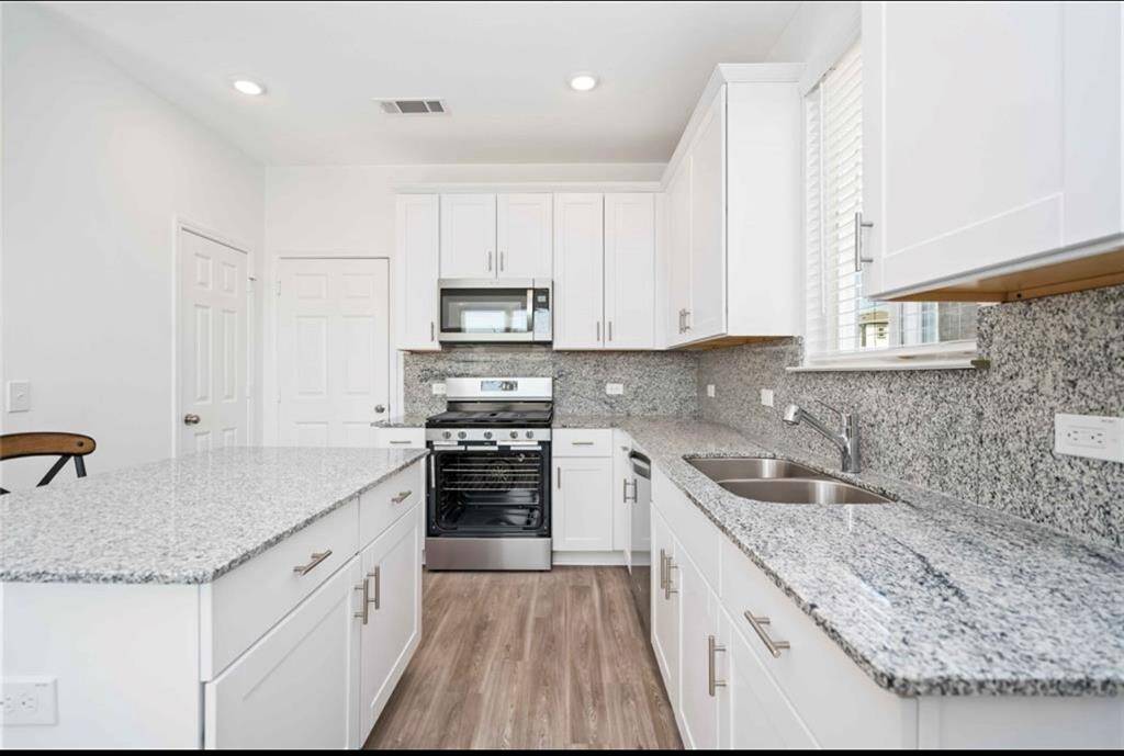 KITCHEN VIEW WITH ISLAND