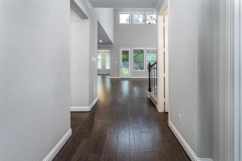 The home floods with natural light as you head to the living.