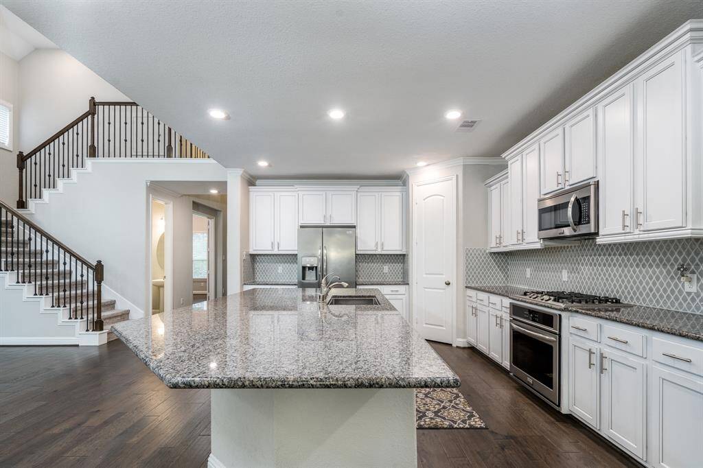Fridge is included! The light and bright kitchen is timeless.