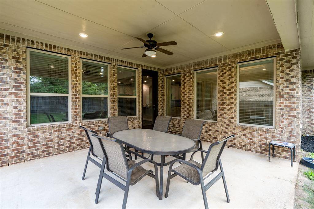Set it up for couches and a TV to extend the entertaining spaces.