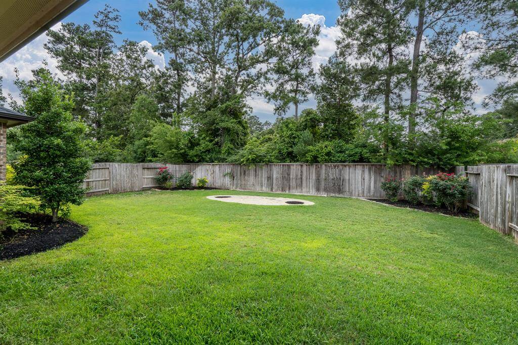 Your view of the treeline behind the home and no back neighbors.