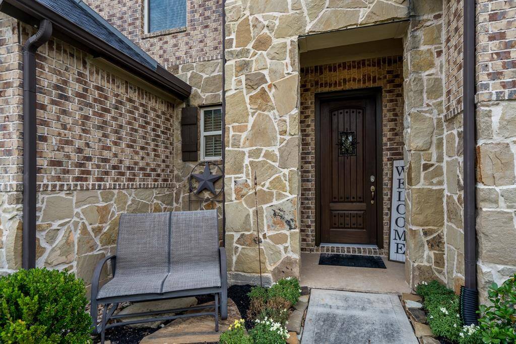 Welcome home! Real wood door with a speak easy portal that opens.