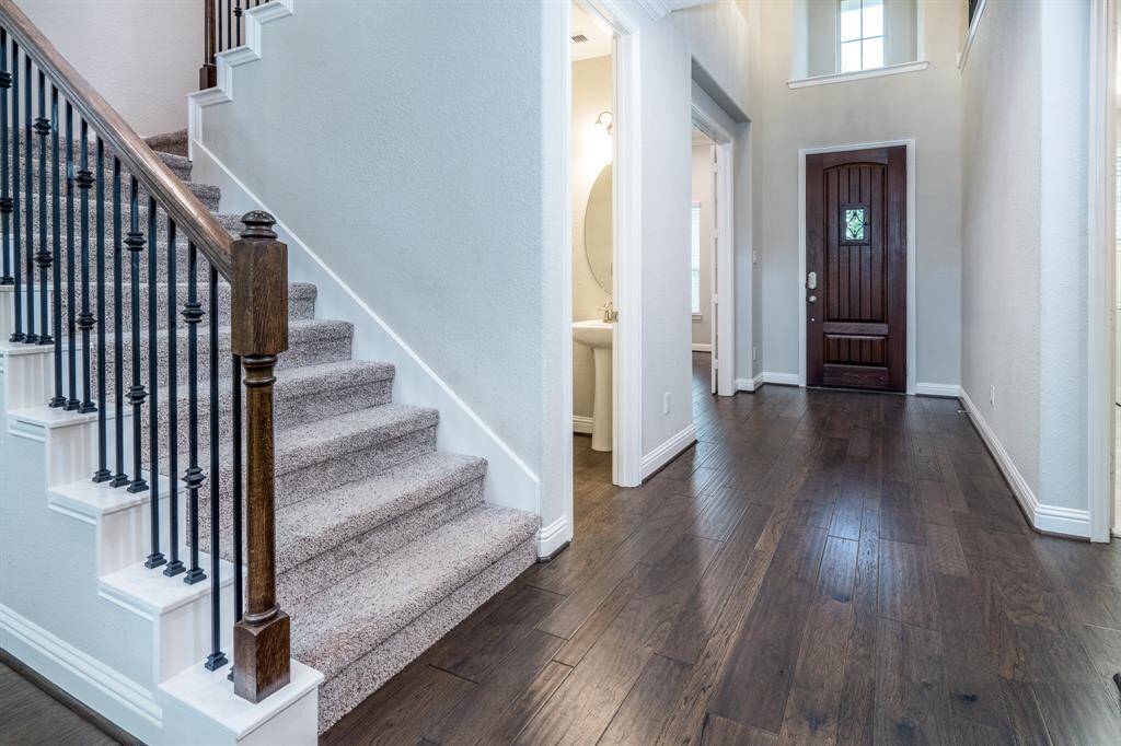 Wood floors throughout much of the downstairs.
