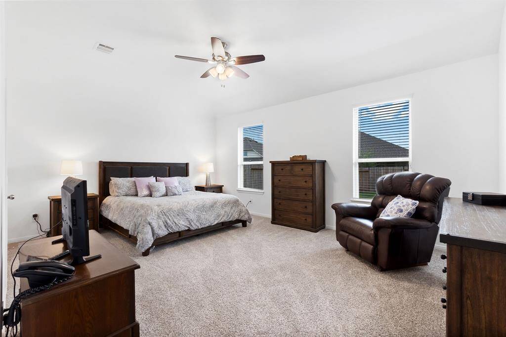 large primary suite with two closets