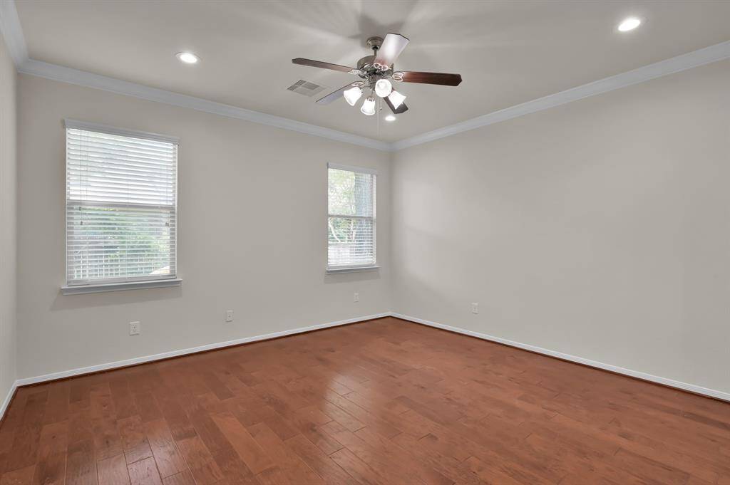 Foyer leading to hall with downstairs bedrooms and secondary bath down.