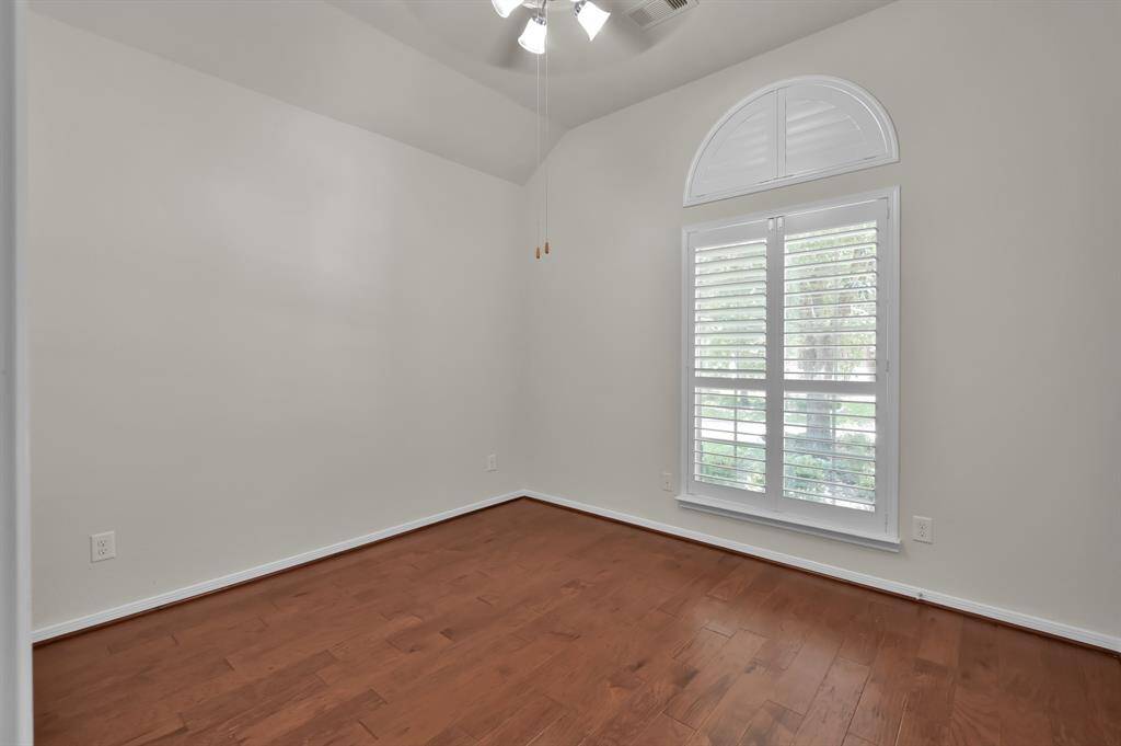 Bedroom #3 downstairs virtually staged