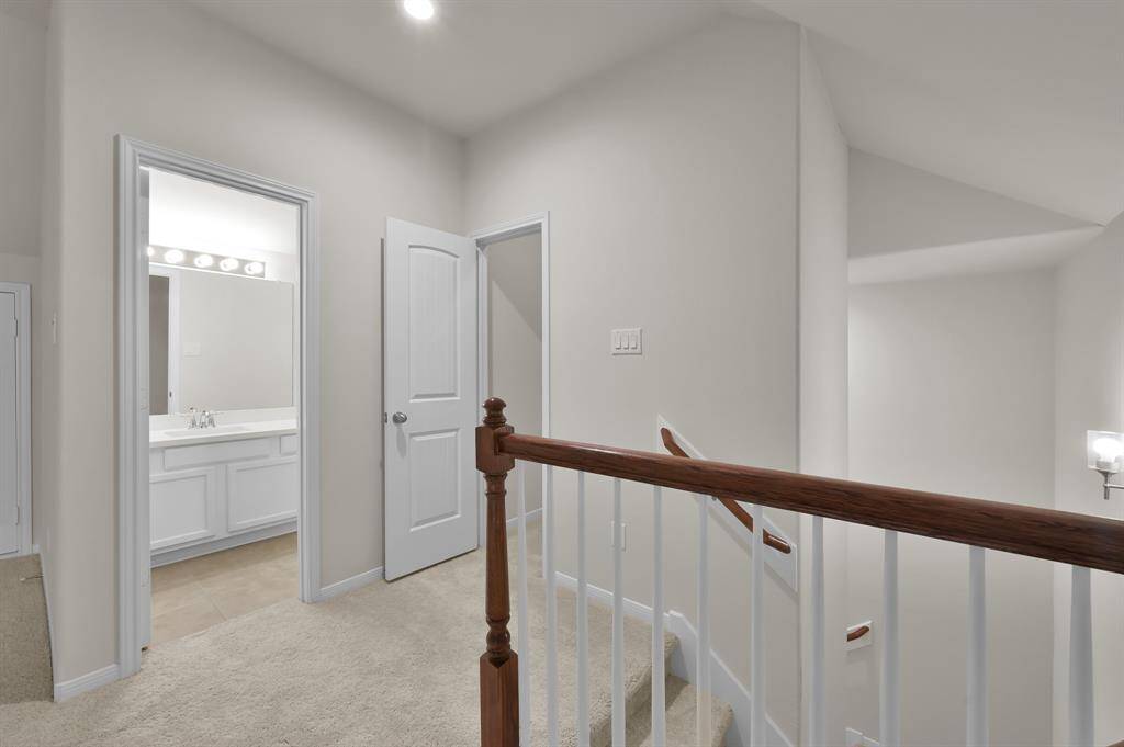 Upstairs game room features brand new carpet, freshly painted and recessed lighting.
