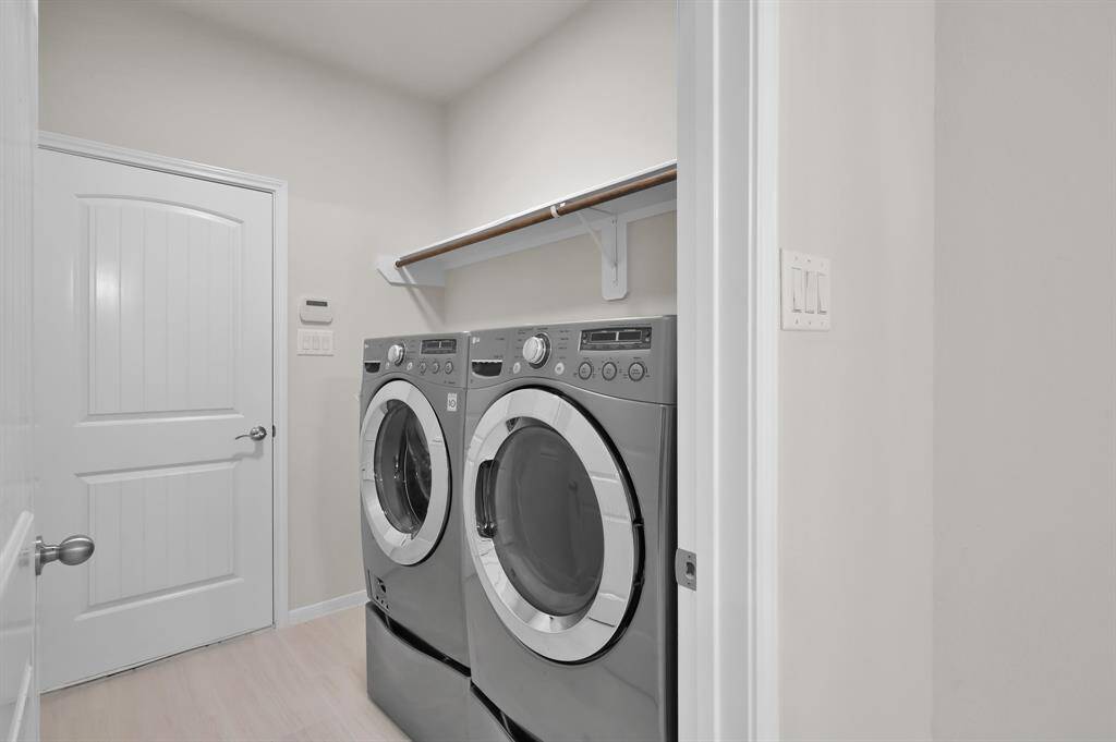 Laundry room and entry to garage. Washer and dryer are included!