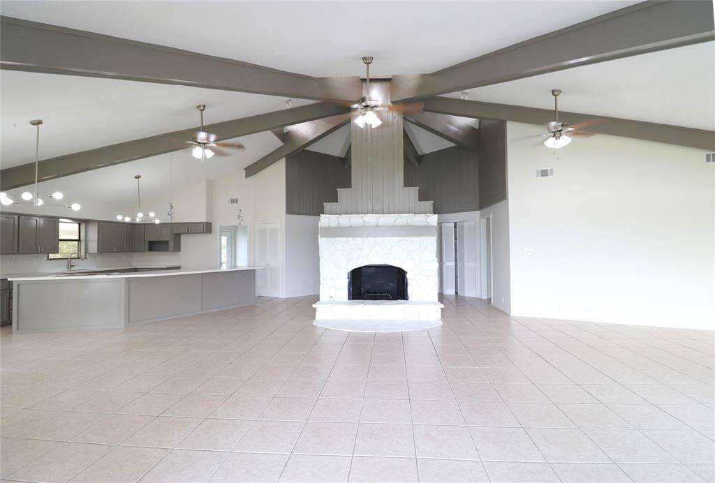 Vaulted ceilings and open concept kitchen.