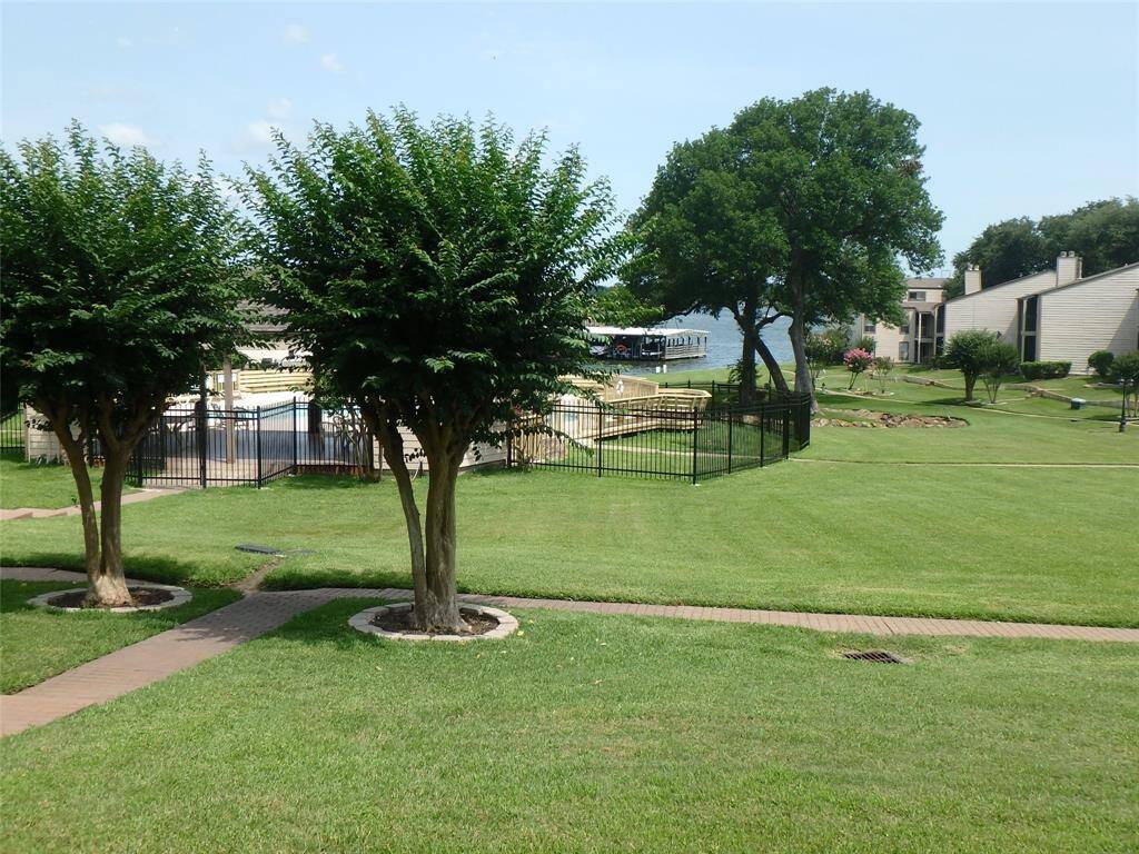 The view of Lake Conroe and the pool from your back patio.