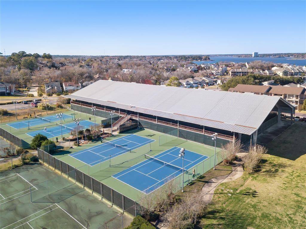 The April Sound Tennis and pickleball courts are nearby.