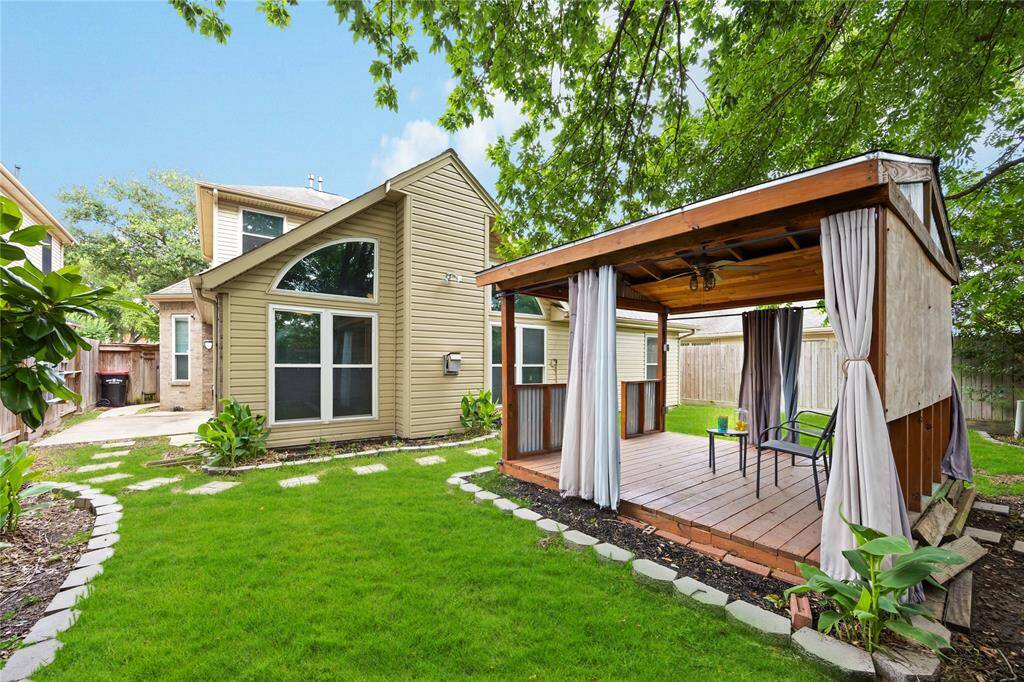 Walk way to back yard and gazebo