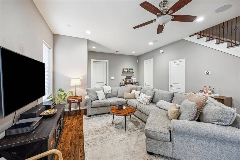 1115 E 27th features a large open concept first floor living, with a kitchen and dining area.