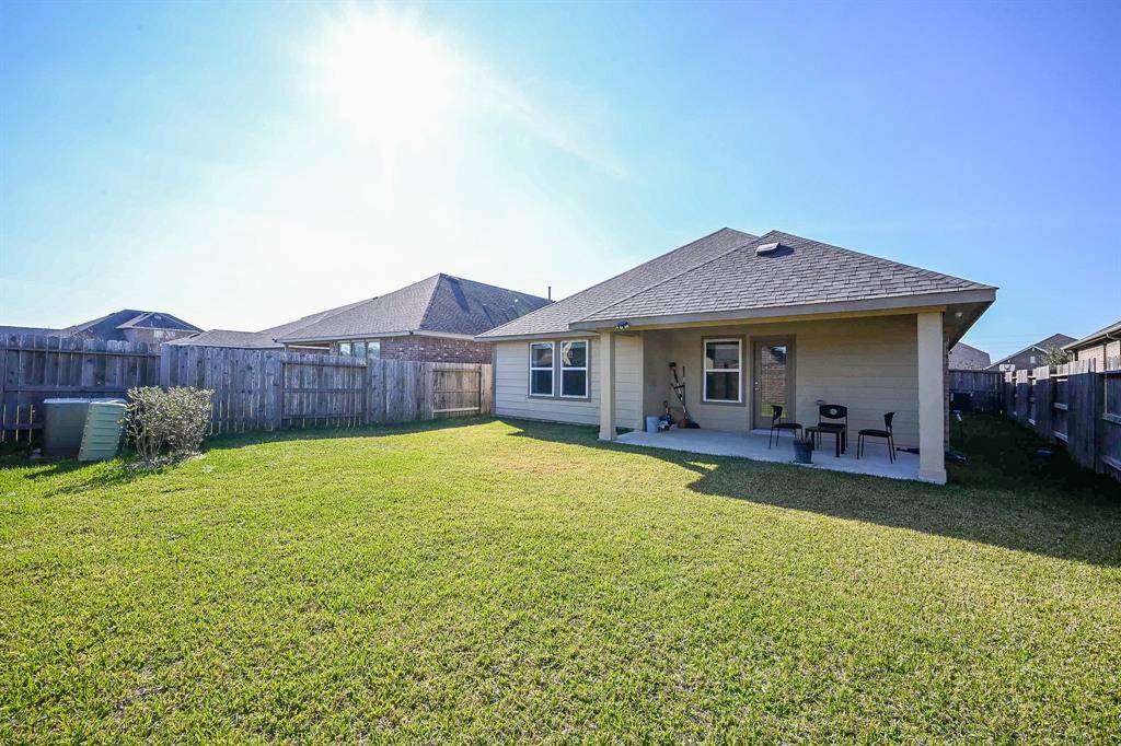 Spacious backyard with a well-maintained lawn