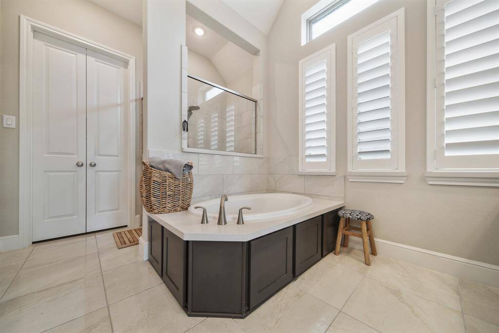 Relax in your deep soaking tub or opt for a quick rinse in the separate shower.