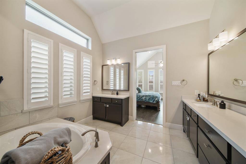 This elegantly designed space combines both functionality and style, transforming your daily routine into a spa-like experience.