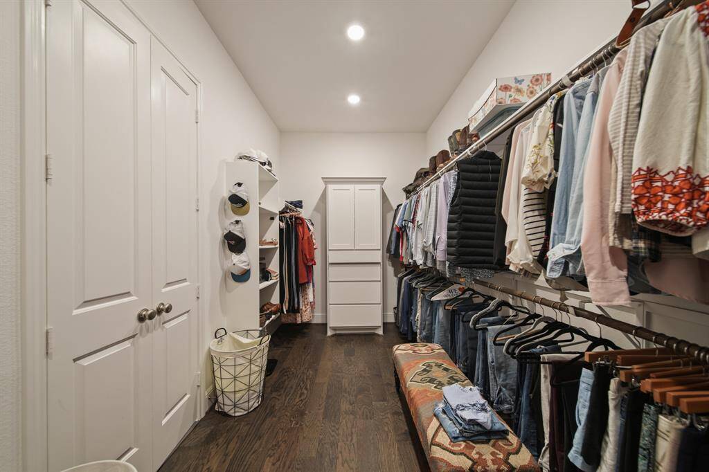 The primary closet provides generous space to store your entire wardrobe while keeping everything neatly organized and easily accessible.