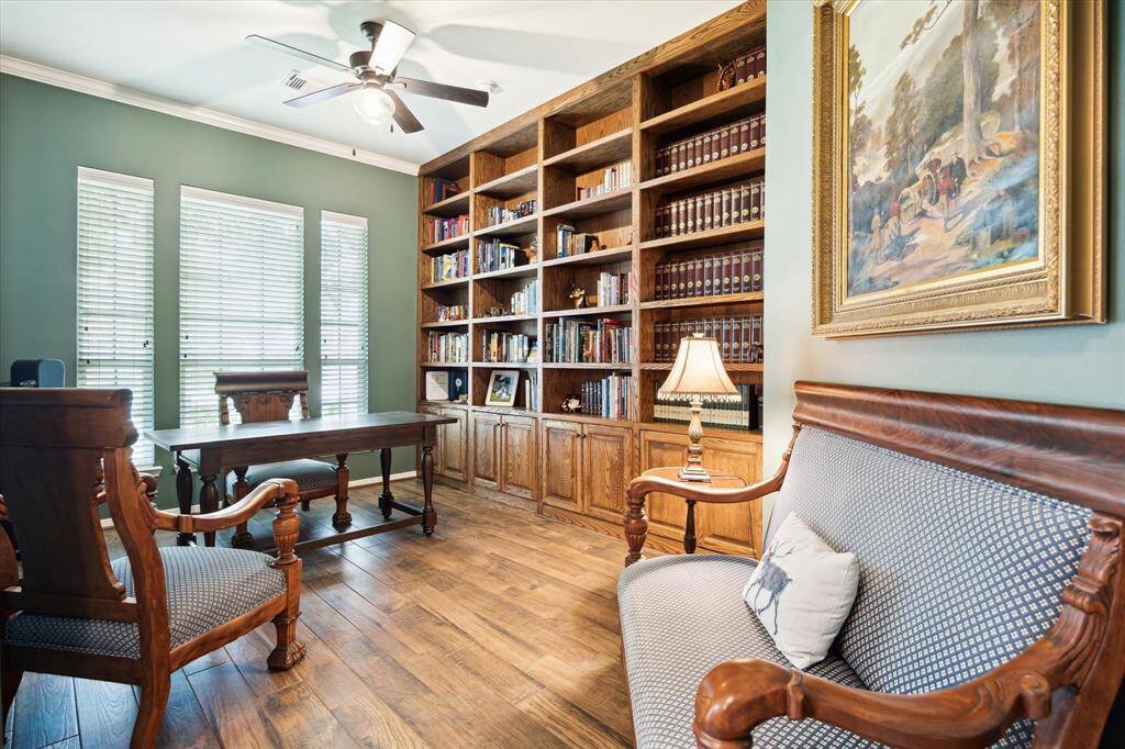 You’re going to love the morning commute to this spacious study with impressive floor-to-ceiling custom built wall for storage and display, and abundant natural light creating an inspiring place to focus, create, or simply enjoy a quiet moment.