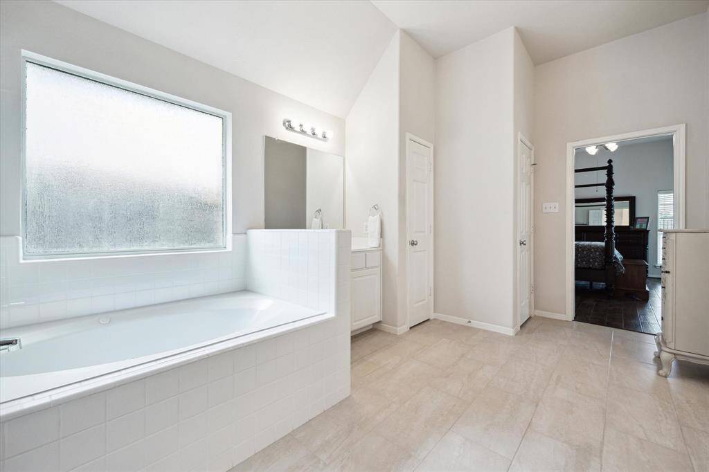 Relax and soak your worries away in this deep soaking tub or enjoy a quick rinse in the spacious walk-in shower. Either way, you'll love this private retreat.