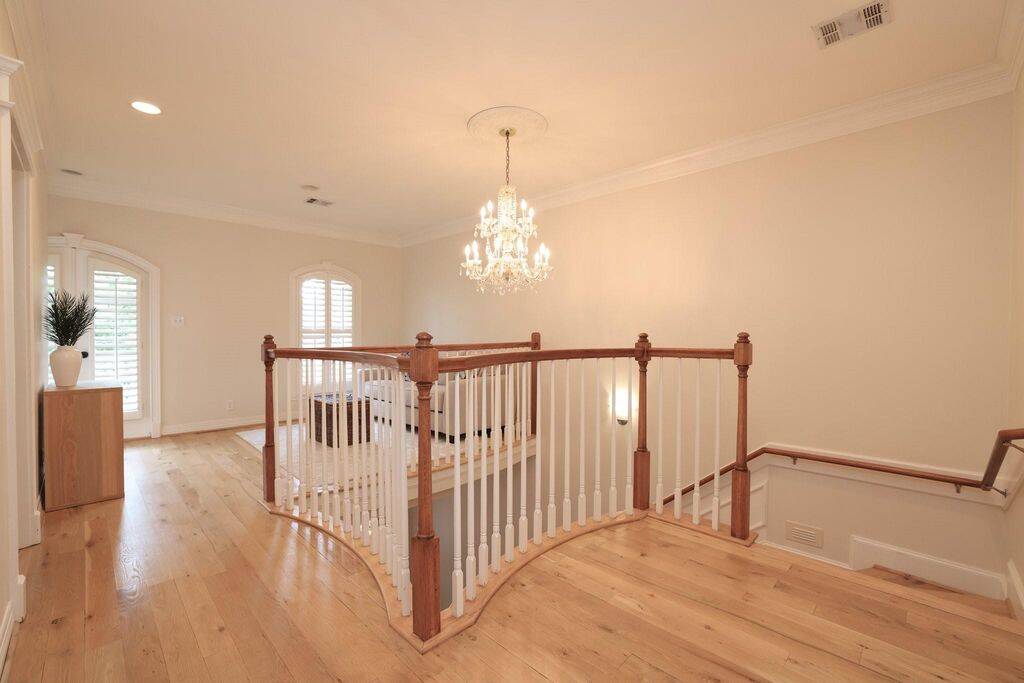 Almost a complete 2nd foyer on the 2nd floor!  Chandelier will transfer with the sale.