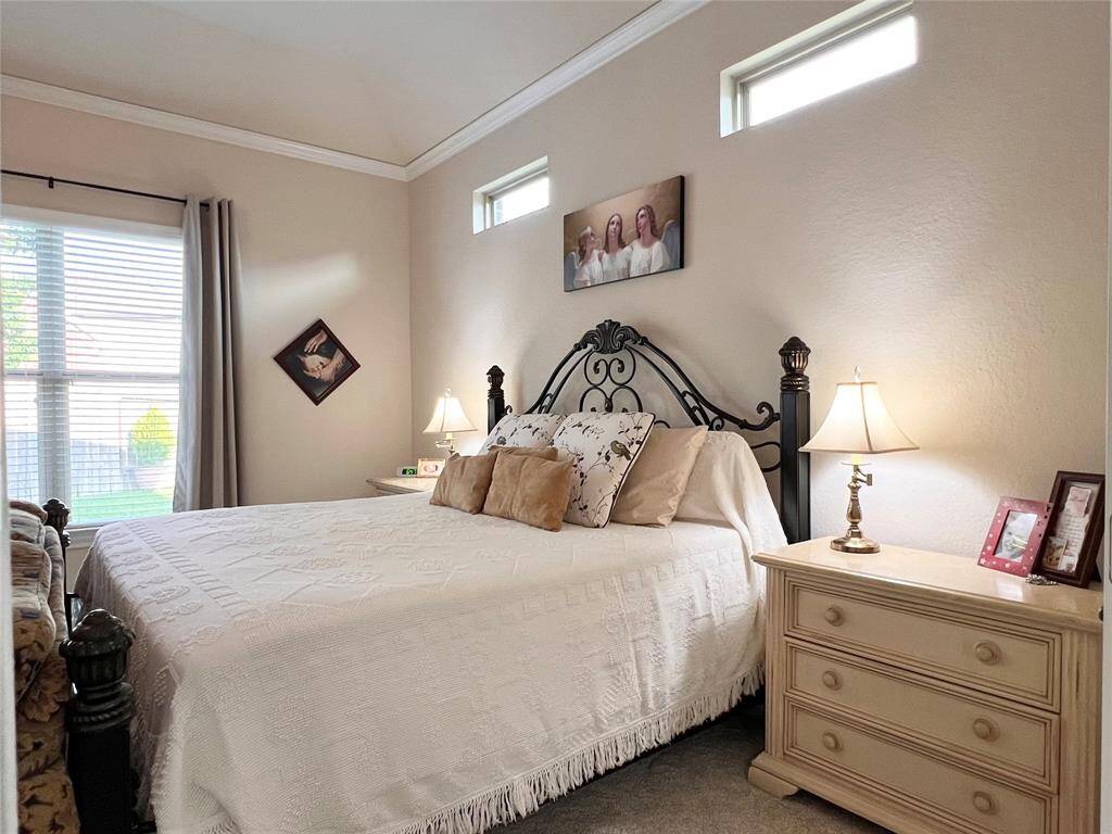 YET, PLENTY OF ROOM FOR A KING SIZE BED!  FINAL TOUCHES INCLUDE CROWN MOULDING, CEILING FAN, AND 2" BLINDS.