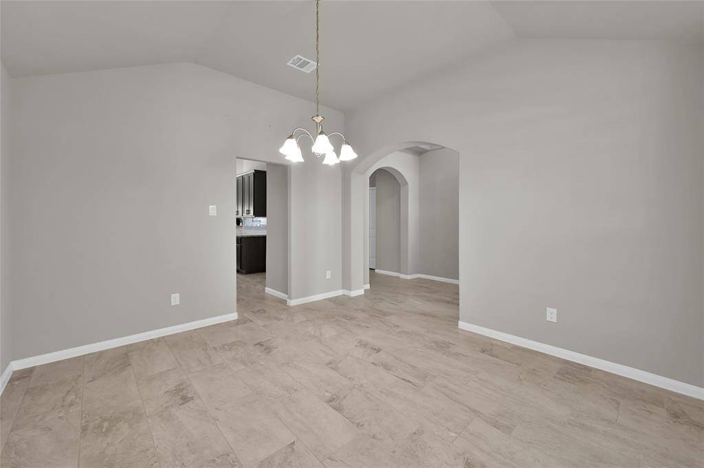 Light and bright Dining Room that can easily be used as a home office.
