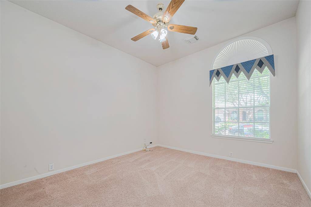 Bedroom #2 features fresh paint, ceiling fan and lush carpet