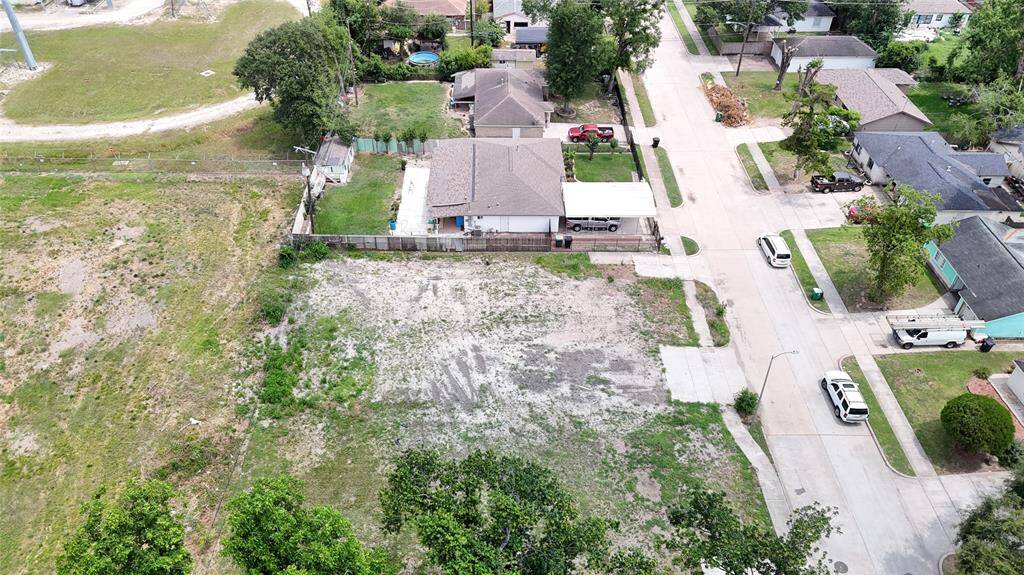 Left half of cleared lots one driveway to left